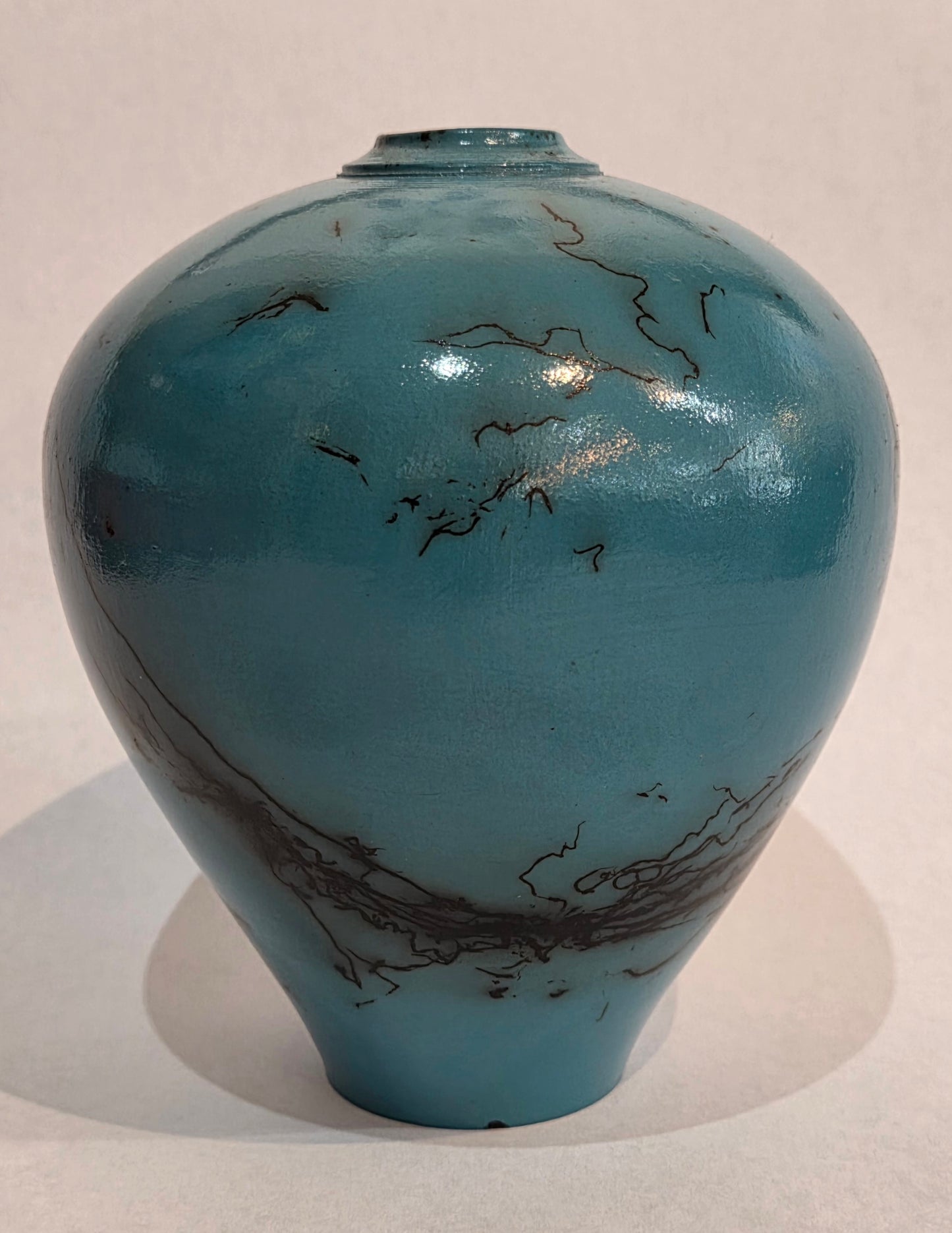 Small Turquoise Horsehair Raku Pot by Bob Smith