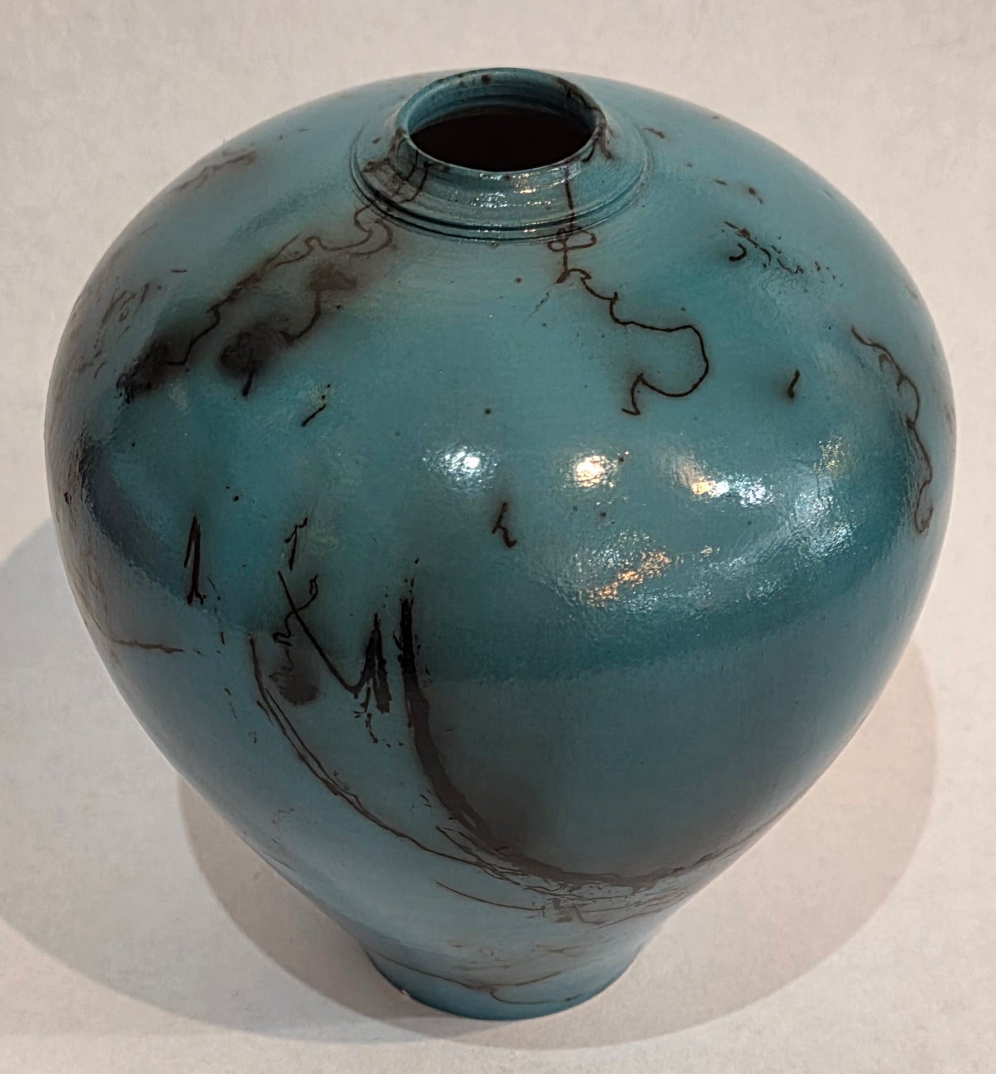 Small Turquoise Horsehair Raku Pot by Bob Smith