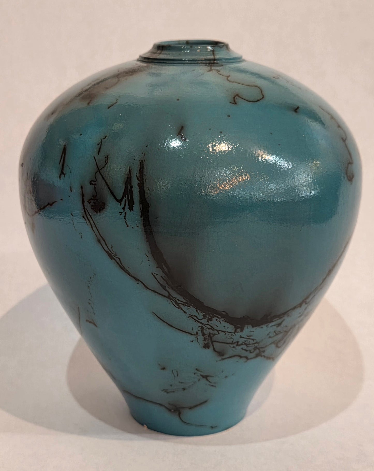 Small Turquoise Horsehair Raku Pot by Bob Smith