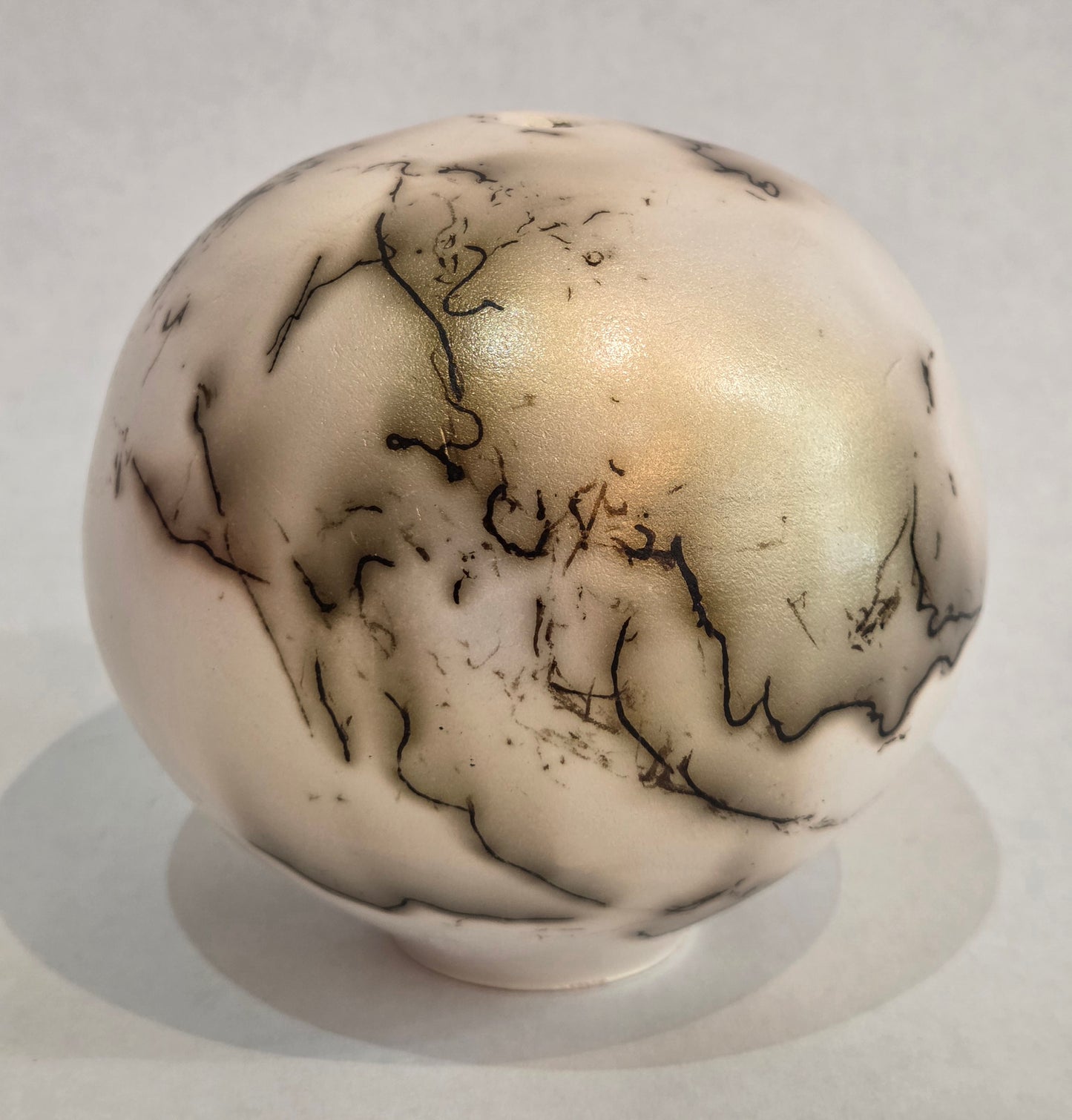 Round White and Gold Horsehair Raku Pot by Bob Smith