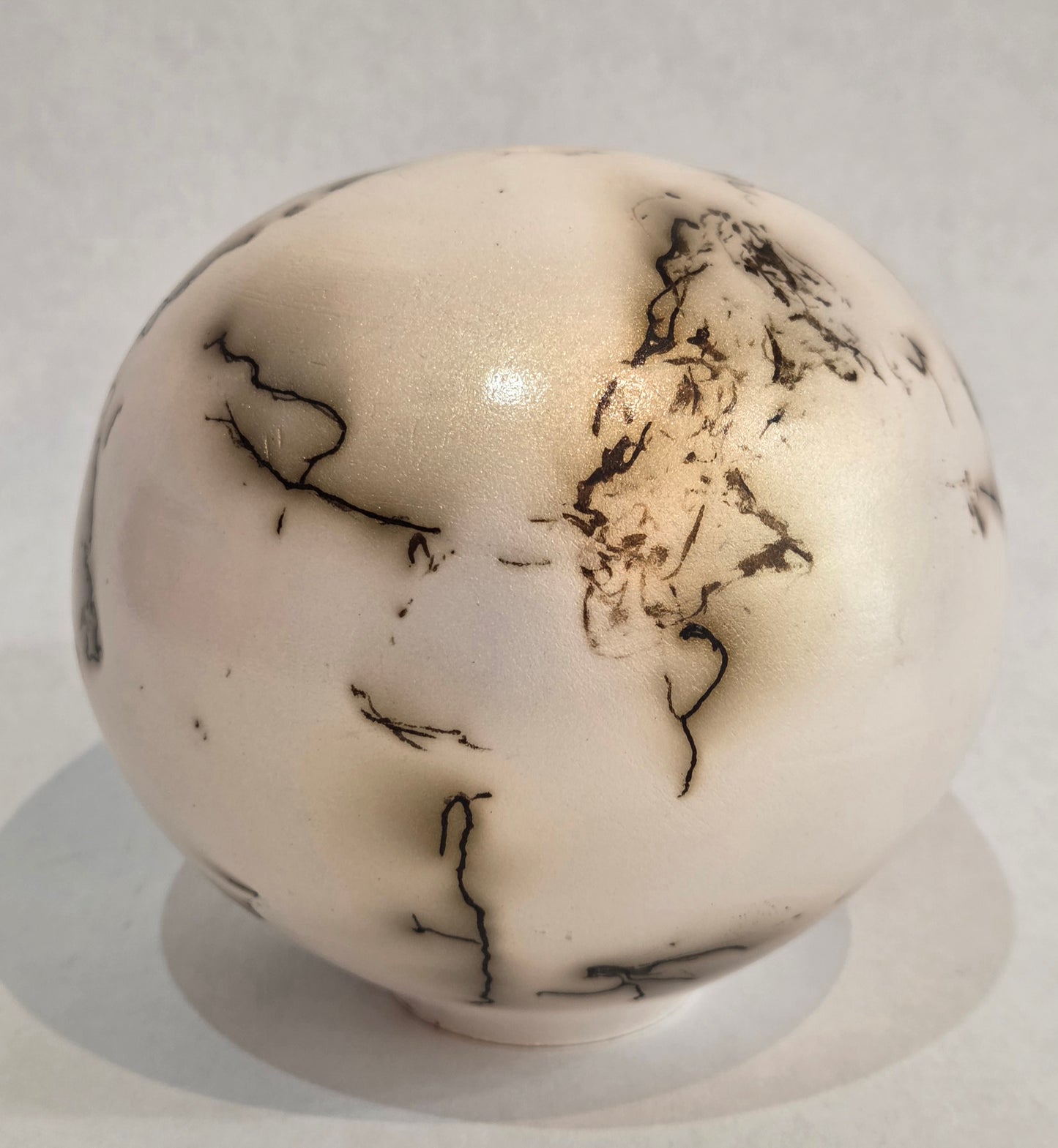 Round White and Gold Horsehair Raku Pot by Bob Smith
